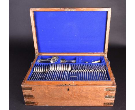 An oak cased canteen, containing a harlequin suite of silver flatware, largely 19th century, comprsing table forks, tablespoo