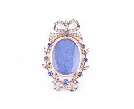 A late 19th / early 20th century diamond and sapphire portrait pendant, the yellow metal oval mount within a border of old ro