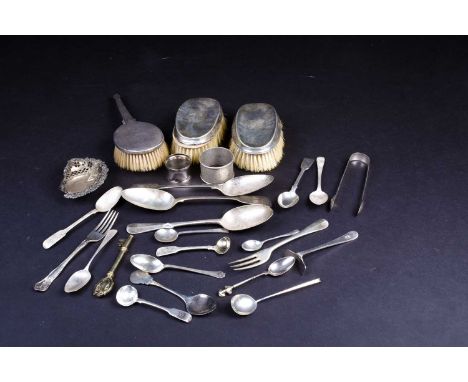 A mixed group of silver items, largely flatware, together with a pair of clothes brushes and a further brush, various dates a