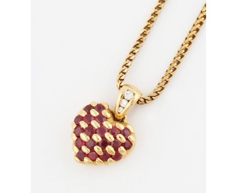 An ruby and diamond pendant in the form of a heart, stamped 750 with CCM, on a snake link chain, stamped 750 with CCM, total 