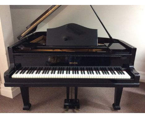 A baby grand piano by Dreaper, in black finished case, numbered to interior '23715 R&D 238013'