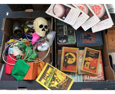 Three boxes of magic items including Goodlife's Abracadabra magazines with various other books and equipment to include skull