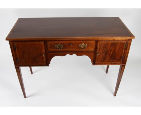 An early 20th Century mahogany side table with light wood inlaid design having central drawer flanked by single door compartm