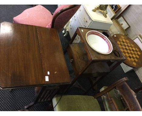 An oak chess table with a mahogany washstand and mahogany drop leaf table.