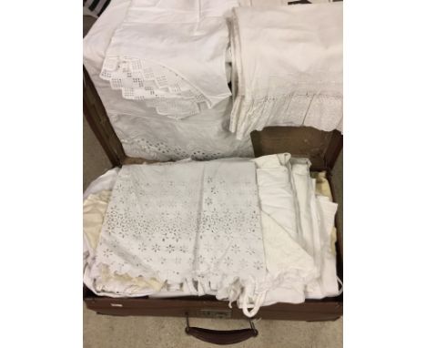 A large quantity of Victorian/Edwardian ladies & children's clothing. In a vintage brown suitcase.   Mostly white cotton, som
