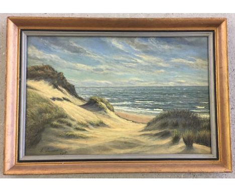 A framed oil on board of a coastal beach scene. By Sander Sylt. Approx. 27 42cm.