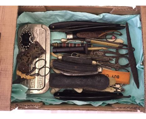 A box of vintage miscellaneous items. To include penknives, buckles, scissors, button hook & cut throat razors. 