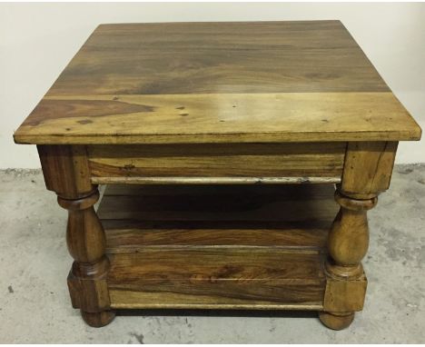 A square shaped Indian rubber wood coffee table. With lower shelf. Approx. 60 x 60cm.