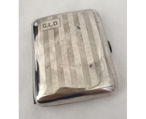 A silver cigarette case. Hallmarked Birmingham 1927. Monogrammed GLD. Approx. weight 79.1g.
