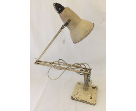 A Herbert Terry cream angle poise lamp. In need of restoration. 