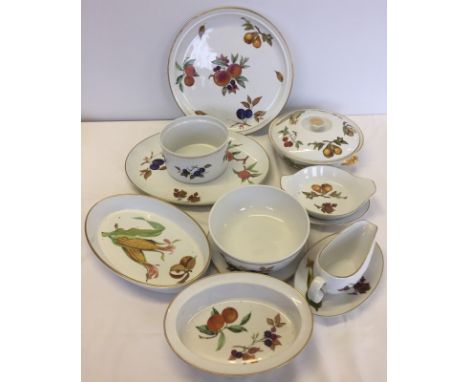 A collection of Royal Worcester " Evesham" dinnerware comprising of 11 pieces. To include a lidded tureen, sauceboat, 2 large