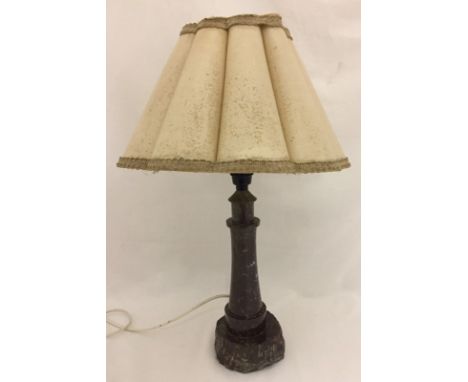 A Victorian Cornish  Serpentine table lamp in the shape of a lighthouse. With cream shade. 