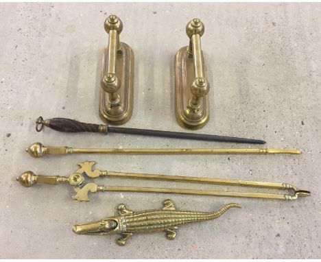 2 brass fire irons together brass fire tongs and pokers. Together with a brass crocodile nutcracker. 