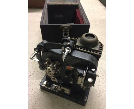 A vintage Bolex home projector in original case. In need of restoration. 