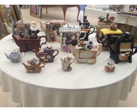 A quantity of ornamental ceramic teapots to inc. Cardew designs
