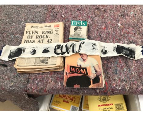 A quantity of Elvis memorabilia to inc magazines, papers and a scarf