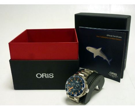 Oris 749 calibre automatic movement with bi-directional red rotor, 38-hour power reserve, date feature at 6 o'clock, ceramic 