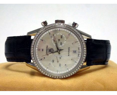 A Tag Heuer 'Carrera' wristwatch, featuring a rare factory white diamond bezel and mother of pearl dial. The stainless steel 