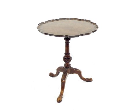 Georgian style mahogany tripod table, with piecrust rim top, wrythen fluted baluster column and acanthus carved legs with pad