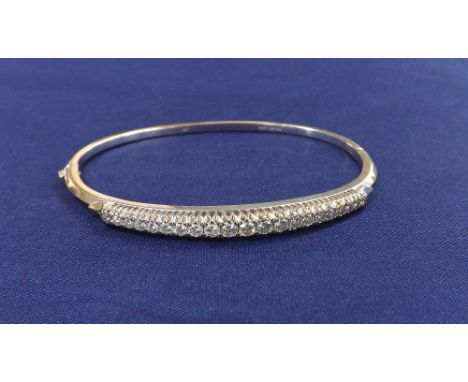 18k diamond claw set bangle, estimated 1.13ct approx, 15.1gm, 65mm