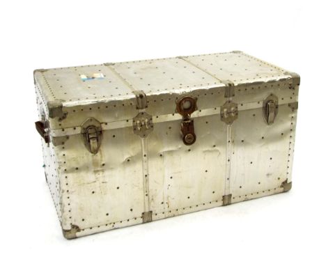 Vintage metal bound trunk, the blue damask interior inset with a liner, 40" wide, 21.5" high