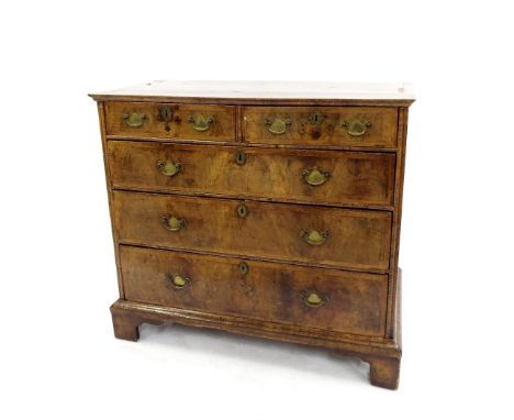 Queen Anne burr walnut veneered and crossbanded chest of drawers, fitted with two short over three long graduated drawers upo