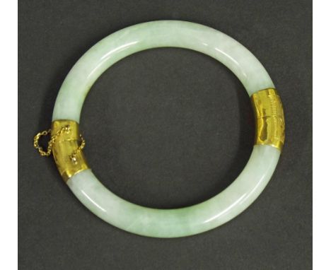 Celadon jade bangle with gold clasp