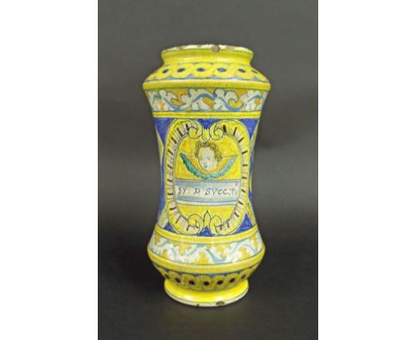 Albarello antique styla waisted drug jar, centrally decorated with a cherub's face over text in a scrolled cartouche frame am