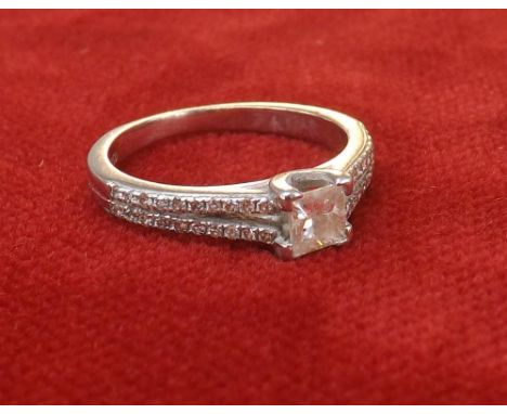 (201600145-1-A) Platinum princess-cut solitaire diamond ring with diamond set shoulders, 0.30ct approx, ring size K