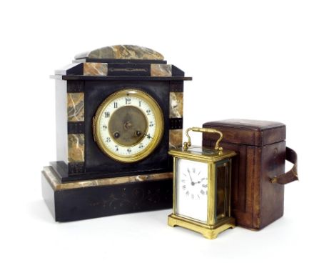 Brass carriage clock within a Morocco leather case; together with a black slate mantel clock inscribed Mansell of Paris (2)
