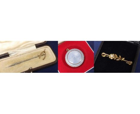 Circular lilac guilloche enamel compact pendant, 36mm diameter; seed pearl blanket safety pin and a wishbone and pearl mounte