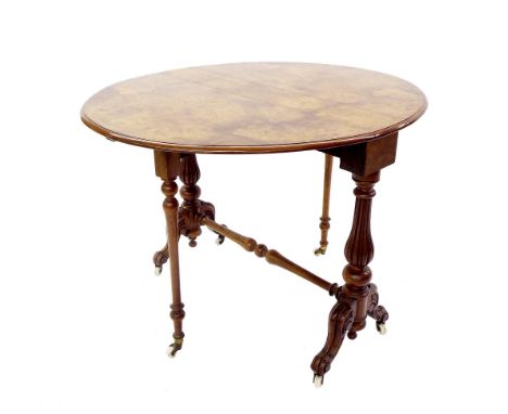 Good Victorian burr walnut Sutherland table, the moulded oval top over two reeded baluster columns united by a stretcher and 