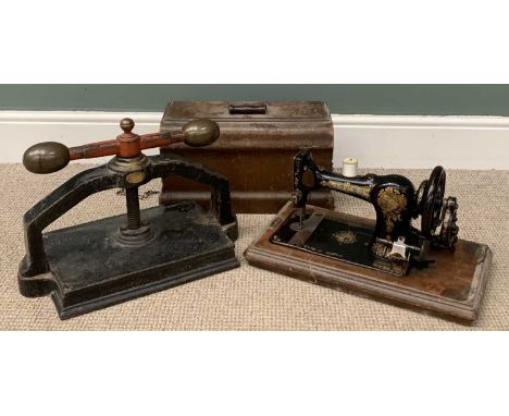 VINTAGE BOOK PRESS, 37 (h) x 52 (w) x 26cms (d) and a wooden cased Jones sewing machineProvenance: private collection Anglese