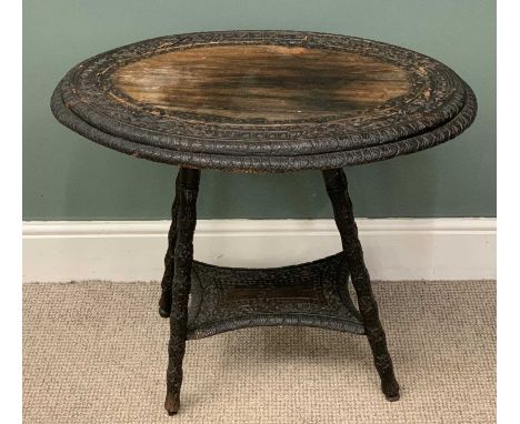 CARVED & EBONISED TEA TABLE with lower shelf, 65 (h) x 79 (w) x 54cms (d)Provenance: private collection Flintshire