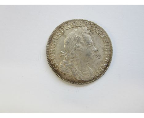 George I,Shilling, 1723, first laureate and draped bust right, R.Crowned cruciform shields, SSC in angles (3647).  Good very 