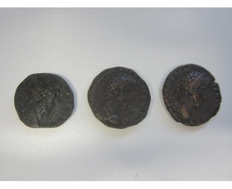 Lucius Verus AD 161-169,Ae asses (2) O. bare head right. R. Two emperors clasping hands;  O. laureate bust right. R. Roma sea