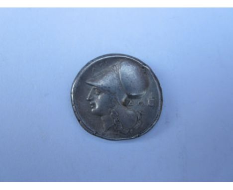 Greece, Anactorium 300-250 BC,Ar stater, weighs 8.48g. O. Pegasos flying left with pointed wing. AN monogram below. R. head o