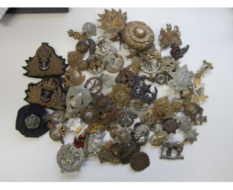 British Military Headdress Badges,fine quality period issues, including Victorian period items; R.Marine Artillery Helmet Gre