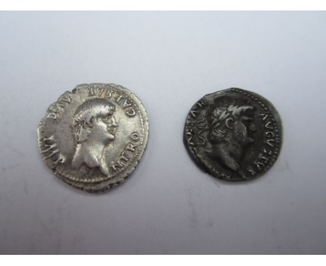 Nero AD 54-68,Ar Denari (2), O. Bare head r, R. Roma stg r, l foot on arms and inscribing shield set on knee. RCV 1939; O. La