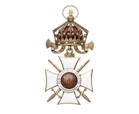 Bulgaria,Order of St.Alexander, sash badge with swords, in gilt metal and enamel. Toned, good very fine. (1)This lot is subje