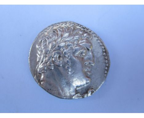 Phoenicia 63/2 BC,Tyre Ar tetradrachm, weighs 14.30g. O. laureate head of Melqarth right, R.eagle standing left on beak of sh