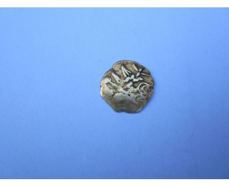 Celtic Remic 1st century BC,Au quarter stater, weighs 1.34g. O. devolved head., R.triple tailed horse right, cog wheel below,