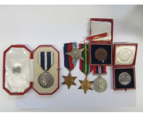A K.P.M. group of four to Senior Superintendent of Police H.B.Langworthy, Malay Police, late General List,King's Police Medal
