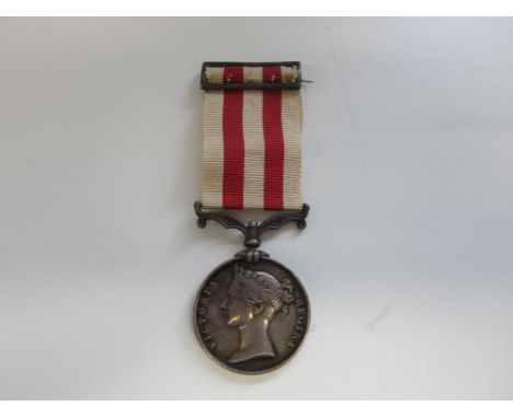 Indian Mutiny 1857-58,no bar (Captn W,H,Kerr. 1st Bn 13th Lt Infy). With riband bar. Light contact marks very fine. (1)Footno