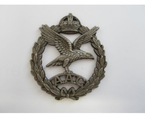 Army Air Corps,an Officer's silver cap badge dated 1942, by J.R.Gaunt. Lugs removed from the rear, otherwise extremely fine. 