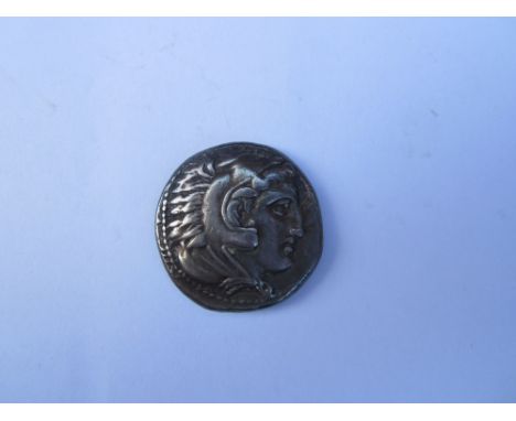 Alexander III 336-323 BC,Ar Tetradrachm, O. Head of Herakle sr, R.Zeus seated l, legs parallel, crescent in field, Price 123a