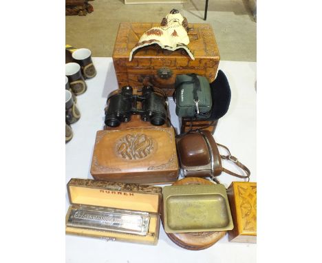 A miniature carved camphor wood chest, 31cm high, a pair of Taylor Hobson XG binoculars, 1943, a Hohner Professional Harmonic