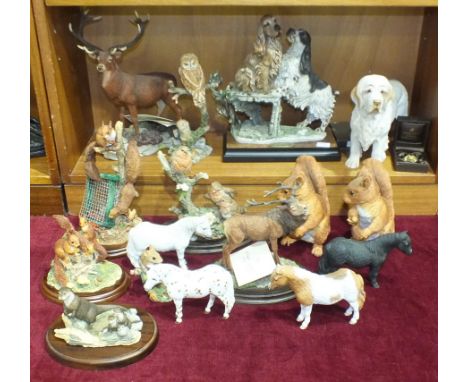 A collection of various modern composite animal sculptures, including a Teviotdale limited-edition 'Red Stag', 30cm high, Bor