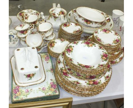 A large quantity of Royal Albert Old Country Roses tea and dinner ware, comprising: large teapot, sugar bowl, twelve cups, fo