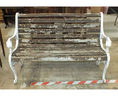 A 20th century alloy garden bench with wood slatted seat. 